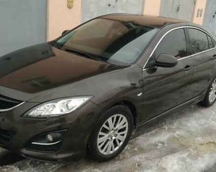 Коричневый Мазда 6, объемом двигателя 2 л и пробегом 251 тыс. км за 6700 $, фото 1 на Automoto.ua