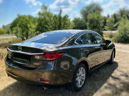 Коричневый Мазда 6, объемом двигателя 2.5 л и пробегом 173 тыс. км за 14000 $, фото 1 на Automoto.ua