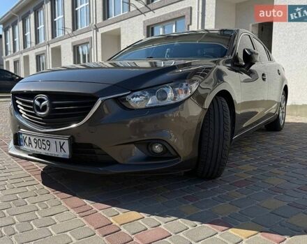 Коричневый Мазда 6, объемом двигателя 2 л и пробегом 229 тыс. км за 13000 $, фото 1 на Automoto.ua
