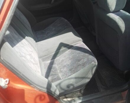 Красный Мазда 6, объемом двигателя 1.8 л и пробегом 294 тыс. км за 1500 $, фото 4 на Automoto.ua