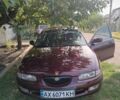 Червоний Мазда 6, об'ємом двигуна 2 л та пробігом 460 тис. км за 2400 $, фото 1 на Automoto.ua