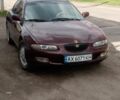 Червоний Мазда 6, об'ємом двигуна 2 л та пробігом 460 тис. км за 2400 $, фото 5 на Automoto.ua