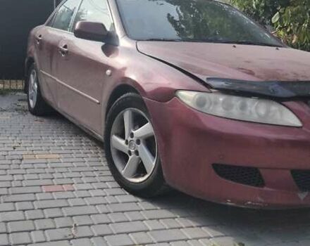 Красный Мазда 6, объемом двигателя 2 л и пробегом 230 тыс. км за 3000 $, фото 1 на Automoto.ua