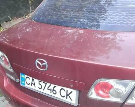 Красный Мазда 6, объемом двигателя 2 л и пробегом 230 тыс. км за 3000 $, фото 2 на Automoto.ua