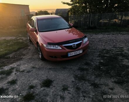 Красный Мазда 6, объемом двигателя 2 л и пробегом 306 тыс. км за 4400 $, фото 2 на Automoto.ua