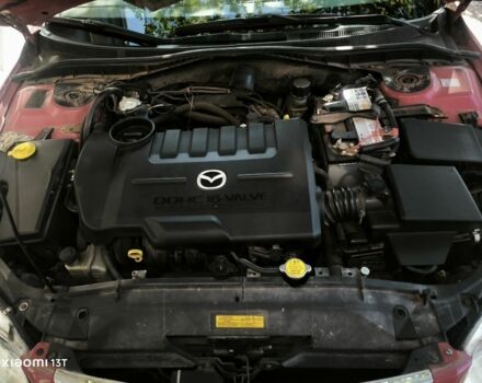 Красный Мазда 6, объемом двигателя 2 л и пробегом 306 тыс. км за 4400 $, фото 9 на Automoto.ua