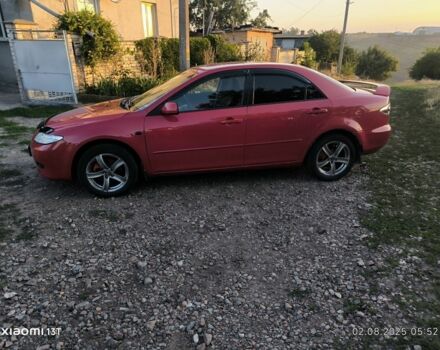 Красный Мазда 6, объемом двигателя 2 л и пробегом 306 тыс. км за 4400 $, фото 4 на Automoto.ua