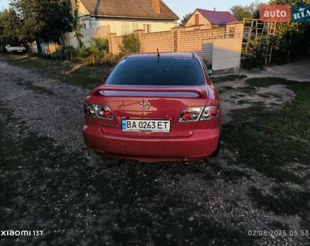 Красный Мазда 6, объемом двигателя 2 л и пробегом 306 тыс. км за 4900 $, фото 1 на Automoto.ua