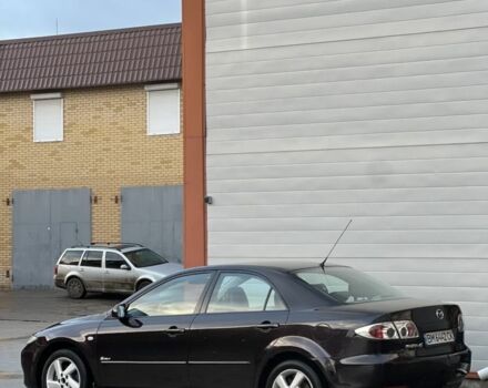 Червоний Мазда 6, об'ємом двигуна 1.8 л та пробігом 200 тис. км за 2900 $, фото 5 на Automoto.ua