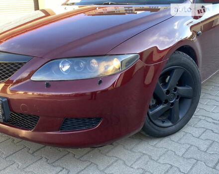 Красный Мазда 6, объемом двигателя 2 л и пробегом 256 тыс. км за 3550 $, фото 7 на Automoto.ua