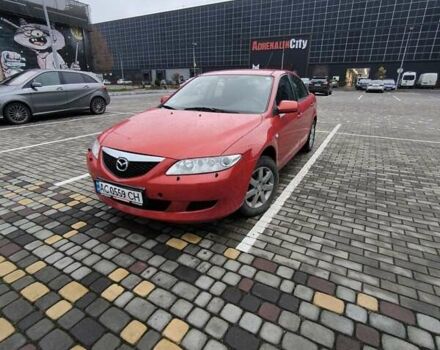 Красный Мазда 6, объемом двигателя 2 л и пробегом 248 тыс. км за 3900 $, фото 1 на Automoto.ua