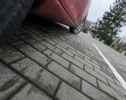 Красный Мазда 6, объемом двигателя 2 л и пробегом 248 тыс. км за 3900 $, фото 7 на Automoto.ua