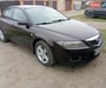 Красный Мазда 6, объемом двигателя 1.8 л и пробегом 285 тыс. км за 4299 $, фото 1 на Automoto.ua