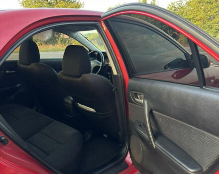 Красный Мазда 6, объемом двигателя 2 л и пробегом 203 тыс. км за 5500 $, фото 5 на Automoto.ua