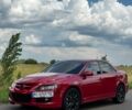 Красный Мазда 6, объемом двигателя 2.3 л и пробегом 245 тыс. км за 5300 $, фото 1 на Automoto.ua