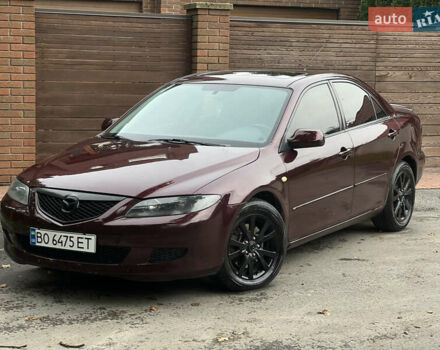 Красный Мазда 6, объемом двигателя 2.3 л и пробегом 250 тыс. км за 4400 $, фото 1 на Automoto.ua