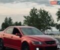 Красный Мазда 6, объемом двигателя 2.3 л и пробегом 210 тыс. км за 6900 $, фото 1 на Automoto.ua