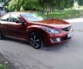 Красный Мазда 6, объемом двигателя 2 л и пробегом 255 тыс. км за 6500 $, фото 1 на Automoto.ua
