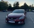 Красный Мазда 6, объемом двигателя 2 л и пробегом 197 тыс. км за 7500 $, фото 1 на Automoto.ua