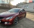 Красный Мазда 6, объемом двигателя 2 л и пробегом 231 тыс. км за 7100 $, фото 1 на Automoto.ua