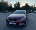 Красный Мазда 6, объемом двигателя 2 л и пробегом 205 тыс. км за 7000 $, фото 1 на Automoto.ua