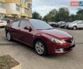 Красный Мазда 6, объемом двигателя 2 л и пробегом 93 тыс. км за 10700 $, фото 1 на Automoto.ua