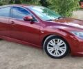 Красный Мазда 6, объемом двигателя 2 л и пробегом 189 тыс. км за 6200 $, фото 1 на Automoto.ua