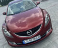Красный Мазда 6, объемом двигателя 2 л и пробегом 250 тыс. км за 6400 $, фото 1 на Automoto.ua