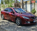 Красный Мазда 6, объемом двигателя 2 л и пробегом 230 тыс. км за 6600 $, фото 1 на Automoto.ua