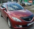 Красный Мазда 6, объемом двигателя 2 л и пробегом 232 тыс. км за 7500 $, фото 1 на Automoto.ua