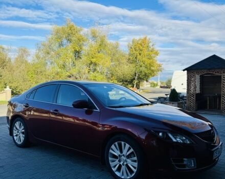 Красный Мазда 6, объемом двигателя 2 л и пробегом 246 тыс. км за 8424 $, фото 2 на Automoto.ua