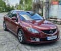 Красный Мазда 6, объемом двигателя 2 л и пробегом 230 тыс. км за 6600 $, фото 1 на Automoto.ua