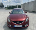 Красный Мазда 6, объемом двигателя 2 л и пробегом 250 тыс. км за 6400 $, фото 1 на Automoto.ua