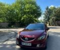 Красный Мазда 6, объемом двигателя 2 л и пробегом 226 тыс. км за 7700 $, фото 1 на Automoto.ua