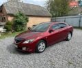 Красный Мазда 6, объемом двигателя 2 л и пробегом 232 тыс. км за 7800 $, фото 1 на Automoto.ua