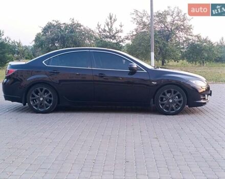 Красный Мазда 6, объемом двигателя 2.5 л и пробегом 236 тыс. км за 7499 $, фото 1 на Automoto.ua