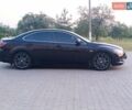 Красный Мазда 6, объемом двигателя 2.5 л и пробегом 236 тыс. км за 7499 $, фото 1 на Automoto.ua