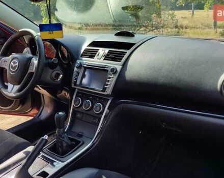 Красный Мазда 6, объемом двигателя 2 л и пробегом 189 тыс. км за 6200 $, фото 9 на Automoto.ua