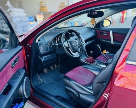 Красный Мазда 6, объемом двигателя 2 л и пробегом 246 тыс. км за 8424 $, фото 4 на Automoto.ua