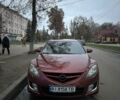 Красный Мазда 6, объемом двигателя 2.5 л и пробегом 295 тыс. км за 7000 $, фото 1 на Automoto.ua