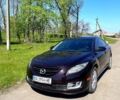 Красный Мазда 6, объемом двигателя 2.5 л и пробегом 300 тыс. км за 6500 $, фото 1 на Automoto.ua
