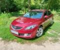 Красный Мазда 6, объемом двигателя 2 л и пробегом 265 тыс. км за 6800 $, фото 1 на Automoto.ua