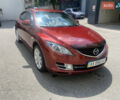Красный Мазда 6, объемом двигателя 2.5 л и пробегом 235 тыс. км за 6800 $, фото 1 на Automoto.ua