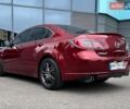 Красный Мазда 6, объемом двигателя 2 л и пробегом 251 тыс. км за 7750 $, фото 1 на Automoto.ua
