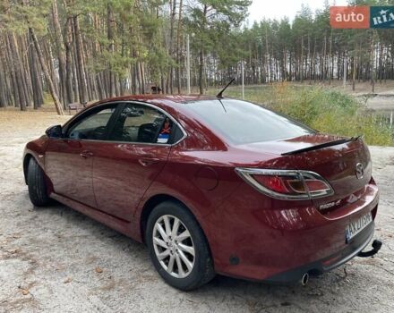 Красный Мазда 6, объемом двигателя 2 л и пробегом 156 тыс. км за 7999 $, фото 2 на Automoto.ua