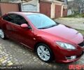 Красный Мазда 6, объемом двигателя 2 л и пробегом 185 тыс. км за 7700 $, фото 1 на Automoto.ua
