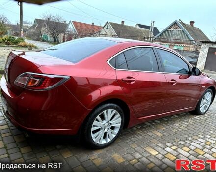 Красный Мазда 6, объемом двигателя 2 л и пробегом 185 тыс. км за 7700 $, фото 1 на Automoto.ua