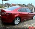 Красный Мазда 6, объемом двигателя 2 л и пробегом 185 тыс. км за 7700 $, фото 1 на Automoto.ua