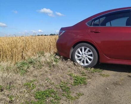 Красный Мазда 6, объемом двигателя 2 л и пробегом 165 тыс. км за 8200 $, фото 7 на Automoto.ua