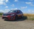 Красный Мазда 6, объемом двигателя 2 л и пробегом 165 тыс. км за 8200 $, фото 1 на Automoto.ua